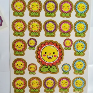 Colorful cartoon smiley flower reward stickers, cute bubble sticker sheet for kids and students.