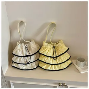 Sac seau plissé à volants pour femme, élégant sac bandoulière en toile avec cordon de serrage.