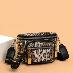 Stylish leopard print women chest bag featuring wide strap and gold hardware for daily trend.
