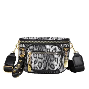 Stylish black white leopard print women fanny pack crossbody chest bag with wide strap.
