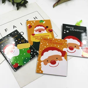Süßes Weihnacht Mini Notizbuch Set, tragbarer Taschenblock mit niedlichem Weihnachtsmann Motiv.