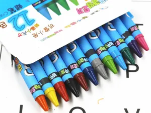 12-color crayon set detail view, colorful oil pastels in paper box for school students painting.