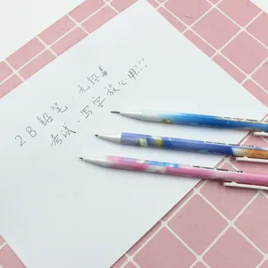 Close-up detail of cute starry sky mechanical pencils on white paper with pink grid background.