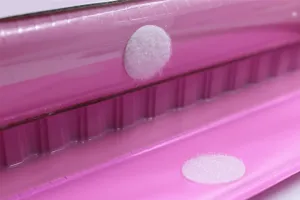 Detailed view of the pink watercolor painting set easel box with velcro fasteners for kids.
