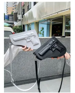Bolso cruzado de cuero PU en forma de pistola para hombres, estilo moto de tendencia.
