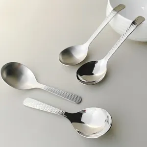 Stainless steel hammered soup spoons set, large bowl design, durable serving tableware.