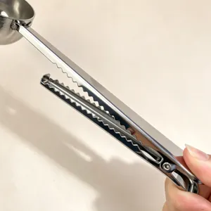 Stainless steel measuring spoon with sealing clip for coffee beans milk powder baking.