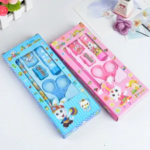 Details of the cute cartoon stationery gift set featuring vibrant blue and pink packaging.