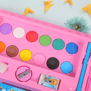 Children watercolor painting stationery set detail view, pink box with brushes and colors.