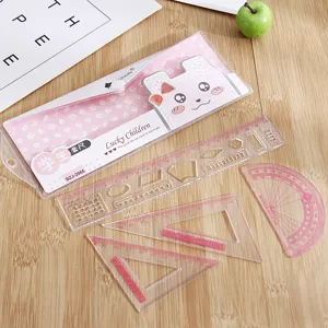 Set de règles transparentes en plastique pour étudiants 4 pièces fournitures scolaires.