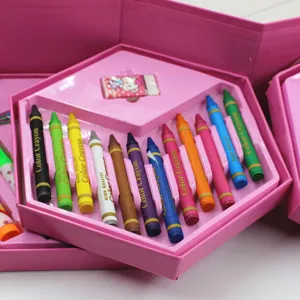 Detailed view of children's colorful crayon stationery set in a pink hexagonal gift box.