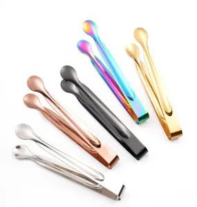 Close-up detail view of multi-color stainless steel ice tongs showing fine polished metallic finish.