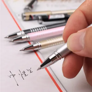Close-up detail shot of metal gel pen writing smoothly on paper with fine tip design.