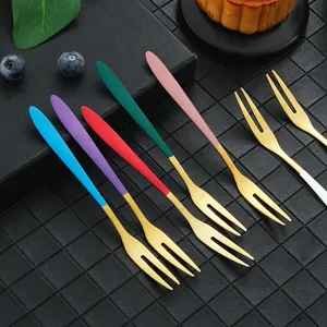 Colorful stainless steel fruit forks and fine dessert cake forks set for home use.
