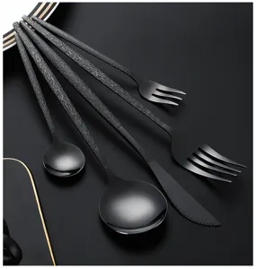 Black stainless steel flatware set 5-piece with hammered handle for kitchen table.