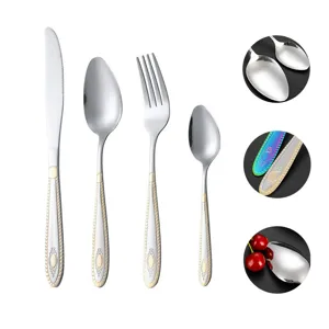 4-piece stainless steel flatware set with elegant gold-accented handle design for home dining.