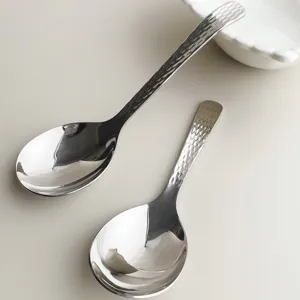 Stainless steel hammered serving spoons set, large head soup spoons for dining and kitchen use.