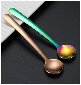 Stainless steel mini spoon close-up, small round coffee spoon and condiment spoon detail.