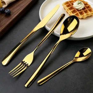 Gold 410 stainless steel flatware set, elegant French style tableware detail view.
