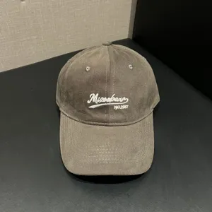 Classic corduroy baseball cap with stylish front white embroidery lettering for casual daily wear.