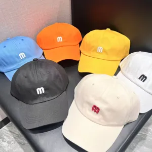 Colorful embroidered letter baseball caps, versatile casual sun hats for men and women.