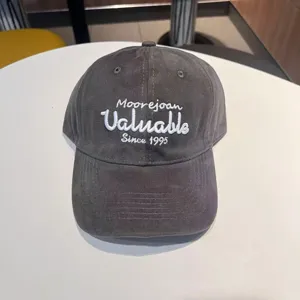 Washed grey baseball cap for men and women, classic soft top dad hat with white embroidery.