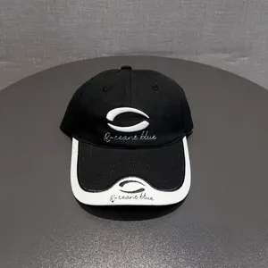 Classic black and white baseball cap for men and women, trendy outdoor sun protection embroidered hat.