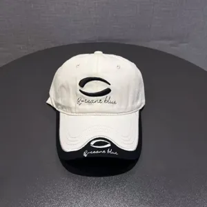 Trendy color-blocked baseball cap for men and women, stylish embroidery sun hat.
