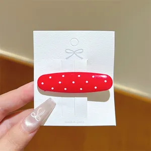 Fermaglio per capelli ovale rosso a pois, graziosa clip coreana per acconciature quotidiane.