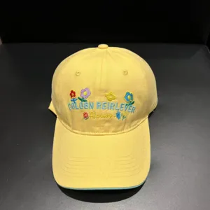 Yellow baseball cap with embroidered flower letters, cute casual summer hat for women.