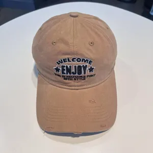 Casual washed cotton baseball cap with embroidered letters, unisex curved brim stylish hat.