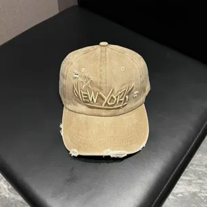 Vintage washed distressed baseball cap for men and women, stylish embroidered letter hat.