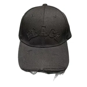 Retro black baseball cap with letter embroidery and distressed brim for men and women