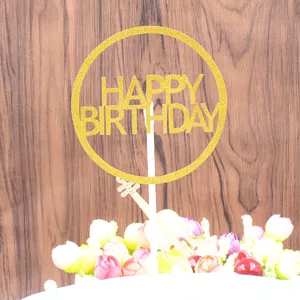 Gold glitter circular happy birthday cake topper detail shot for party celebration decor.