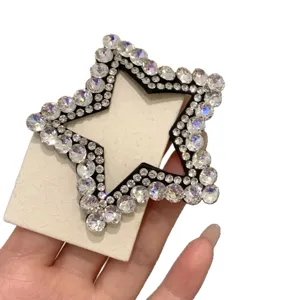 Glitzernde Strass Stern Haarklammer, elegante hohle Seitenklammer fuer Damen Haarschmuck.