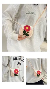 Close-up details of handmade crochet flower mini crossbody bag with cute yarn texture.