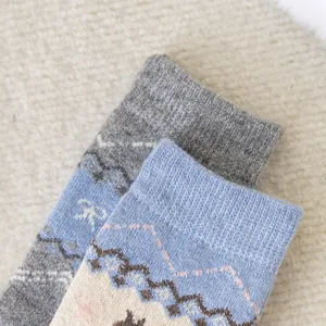 Retro ethnic style thickened winter wool socks with geometric diamond pattern for warm wear.