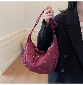 Quilted bow dumpling shoulder bag, lightweight casual crossbody tote for women winter 2025.