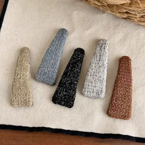 Ensemble de pinces à cheveux en tweed élégantes, pinces à clic en tissu chic pour femmes tendance.