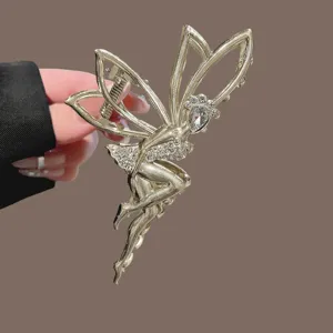 Gold fairy hair claw clip with sparkling rhinestones, elegant shark clip for thick hair styling.