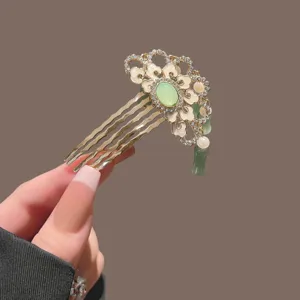 Traditional Chinese hair comb with green jade stone, elegant rhinestone and bamboo tassel.