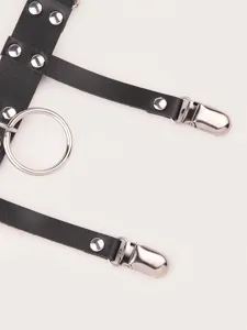 Black punk leather garter belt detail shot featuring metal O-ring and sturdy clips.