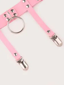 Pink punk leather leg garter belt detail shot, Y2K style metal ring thigh harness accessory.