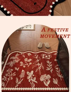 Red festive loop velvet doormat with botanical white pattern for entrance home decor.