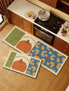 Kitchen floor mat detail showing pumpkin and leopard print pattern, absorbent non-slip surface.