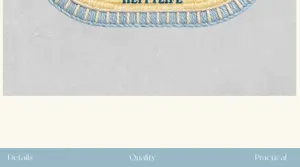 Detailed close-up of oval bathroom floor mat with blue white border and embroidered text.