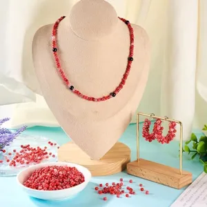 Handmade red glass seed bead necklace and earrings jewelry DIY crafting set showcase.