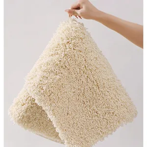 Fluffy shag area rug for bedroom bedside, soft cozy cream fuzzy mat for home floor decor.