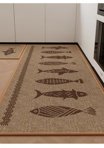 Détail de l'ensemble de tapis de cuisine tissé texturé avec un joli motif de poissons.