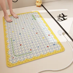 Detailed view of dopamine style anti-slip bathroom shower mat with suction cups and dots.